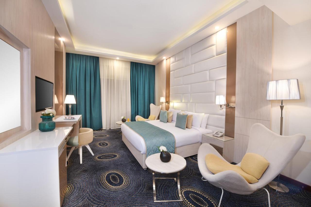 Tolip Gardens Hotel Cairo Exterior photo Deluxe Room